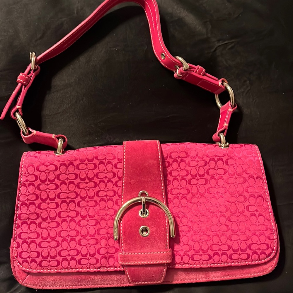 Coach raspberry mini handbag. Never used. No stains, rips or tears. Beautiful!